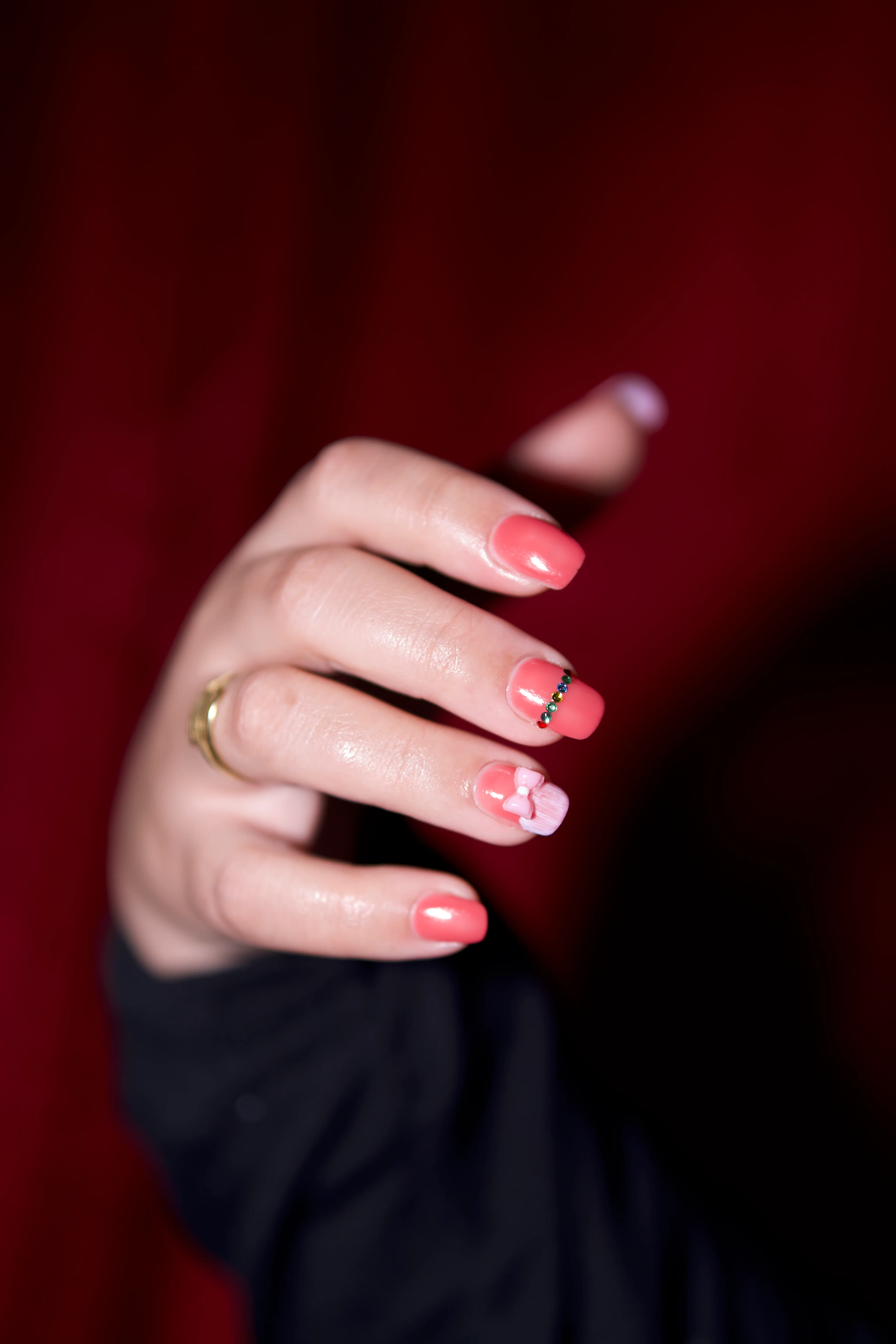 Pink nails with a floral detail
